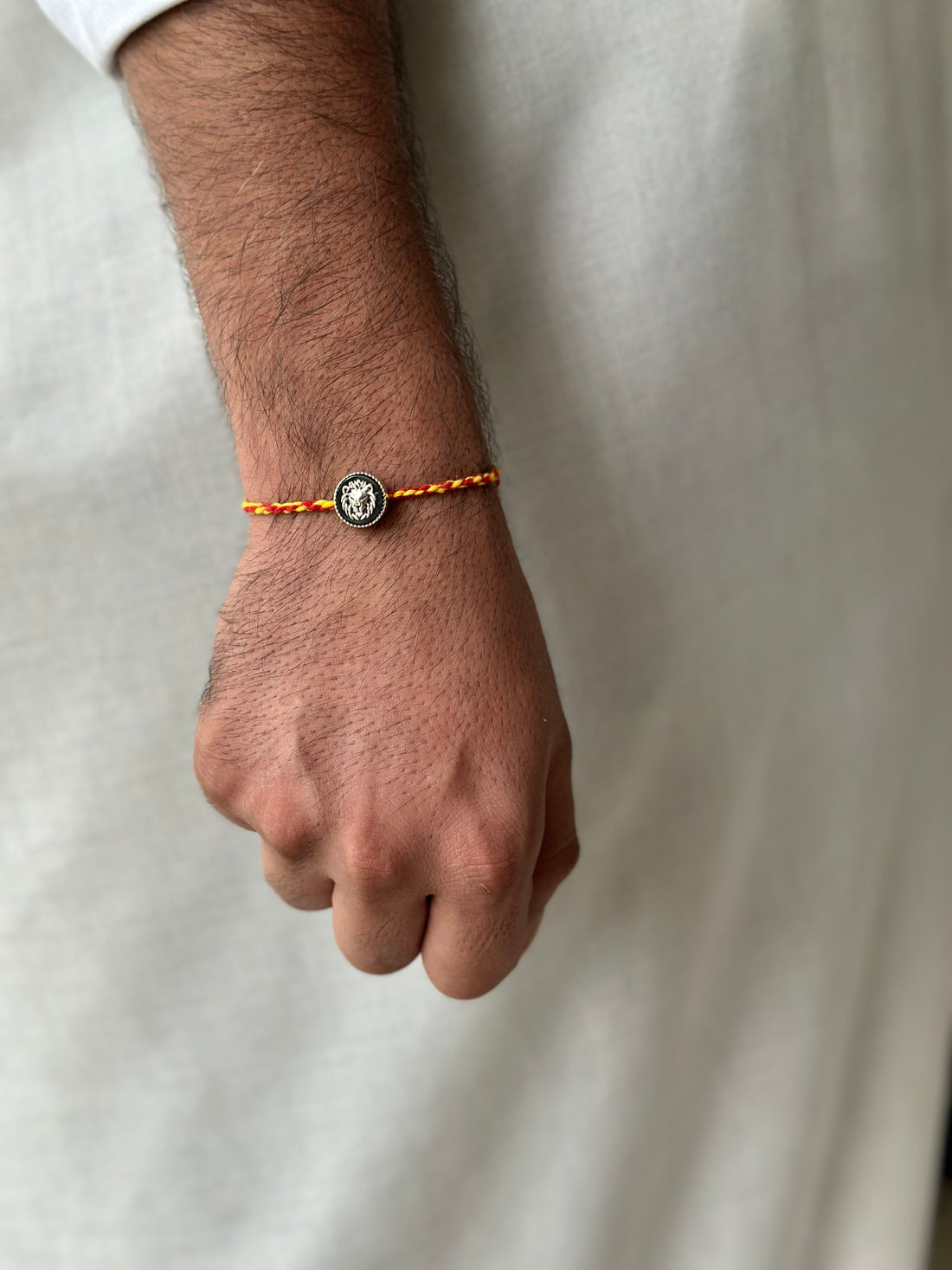 OG Lion Rakhi cum pendant in 92.5 fine silver – Eterno India