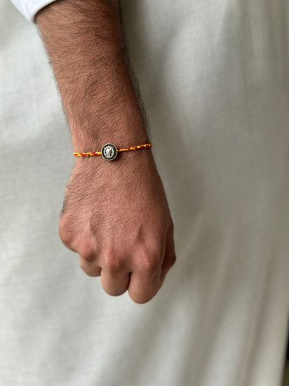 OG Lion Rakhi cum pendant in 92.5 fine silver – Eterno India