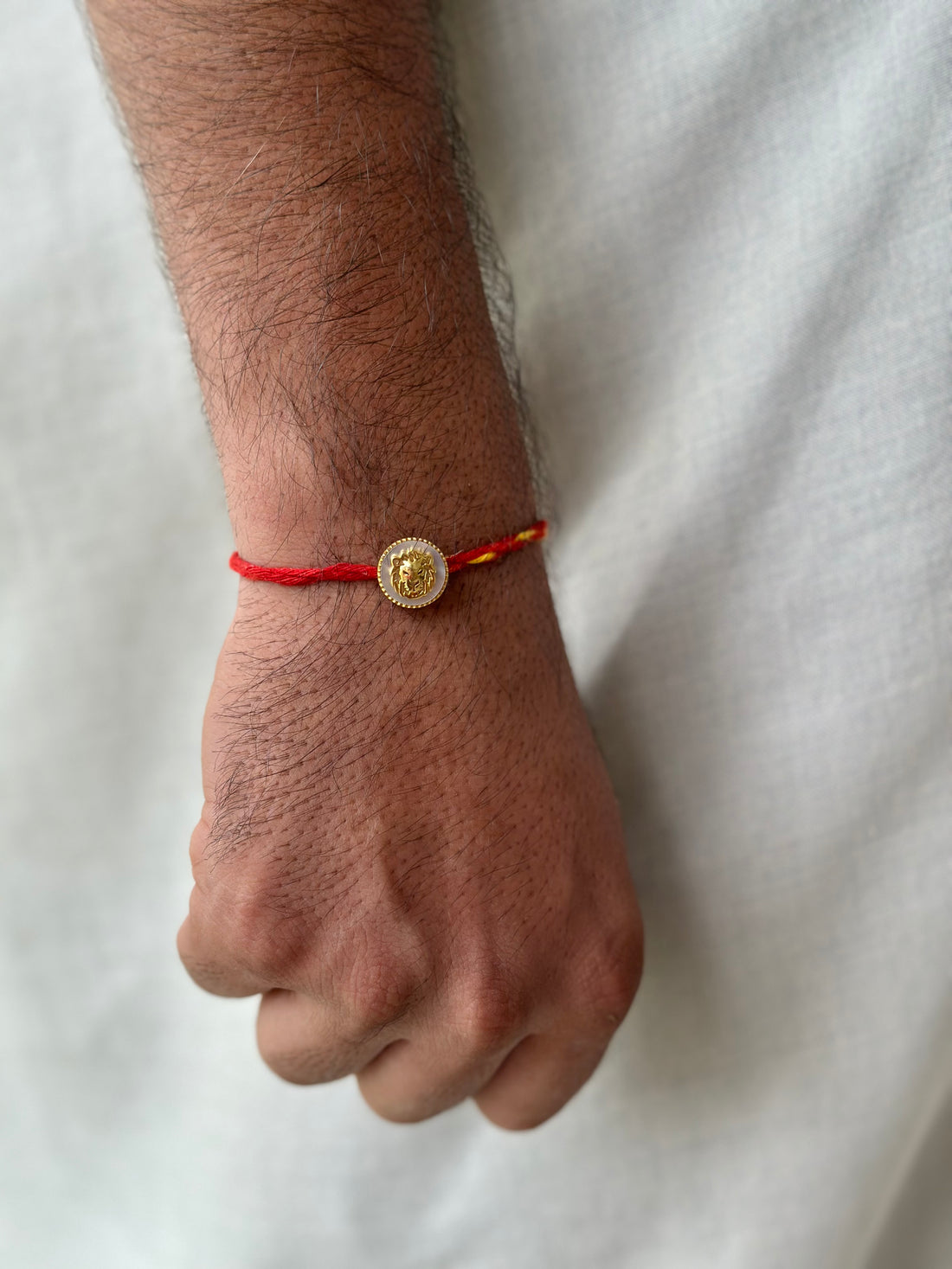 OG Lion Rakhi cum pendant in 92.5 fine silver – Eterno India