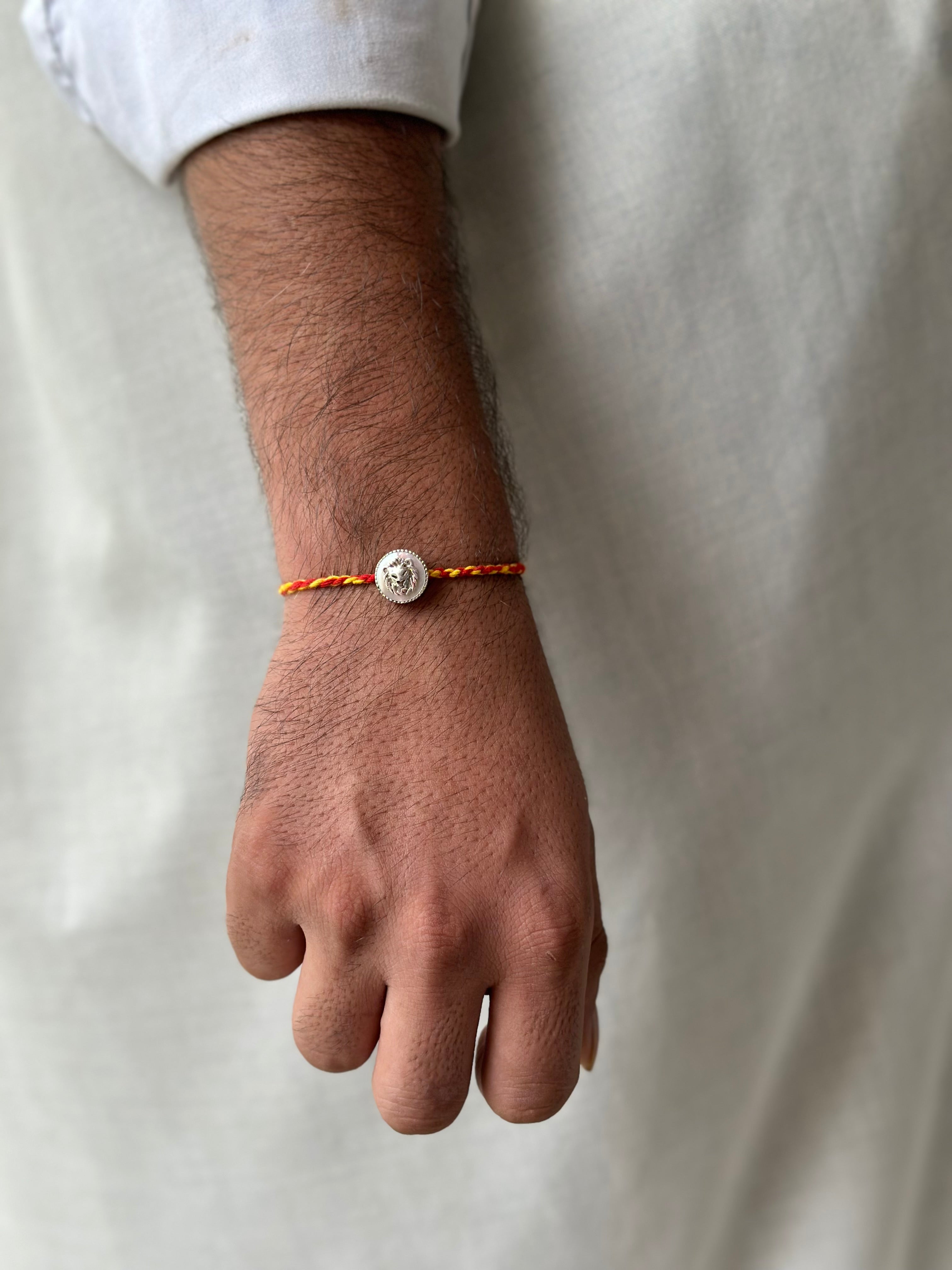 OG Lion Rakhi cum pendant in 92.5 fine silver – Eterno India