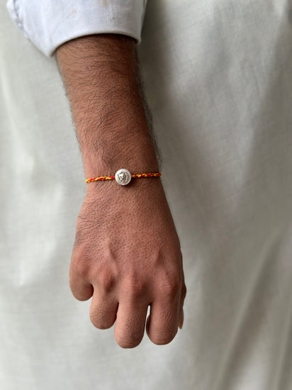 OG Lion Rakhi cum pendant in 92.5 fine silver – Eterno India