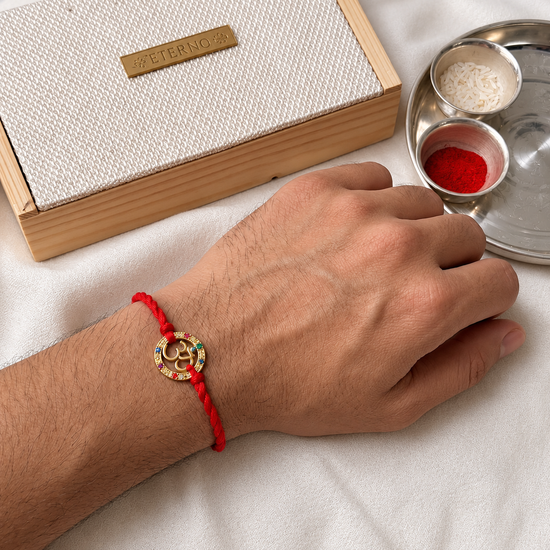 Navratna Om Rakhi cum pendant in 92.5 fine silver with nine gemstones – Eterno India