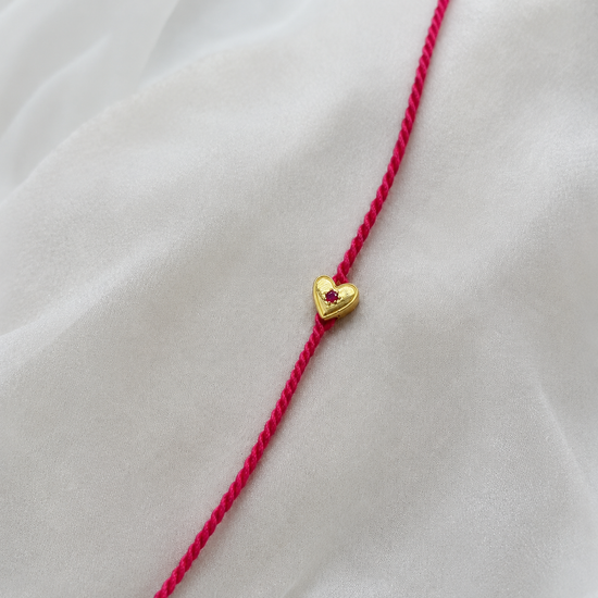Heart Ruby Rakhi in 92.5 fine silver with ruby gemstone – Eterno India