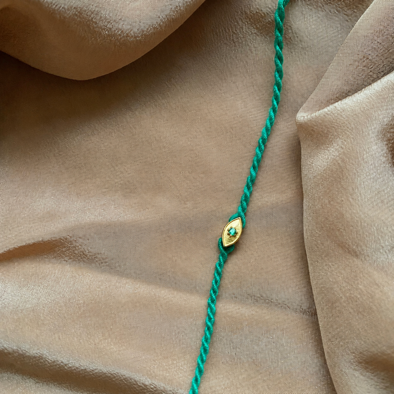 Eye Emerald Rakhi (92.5 Fine Silver)